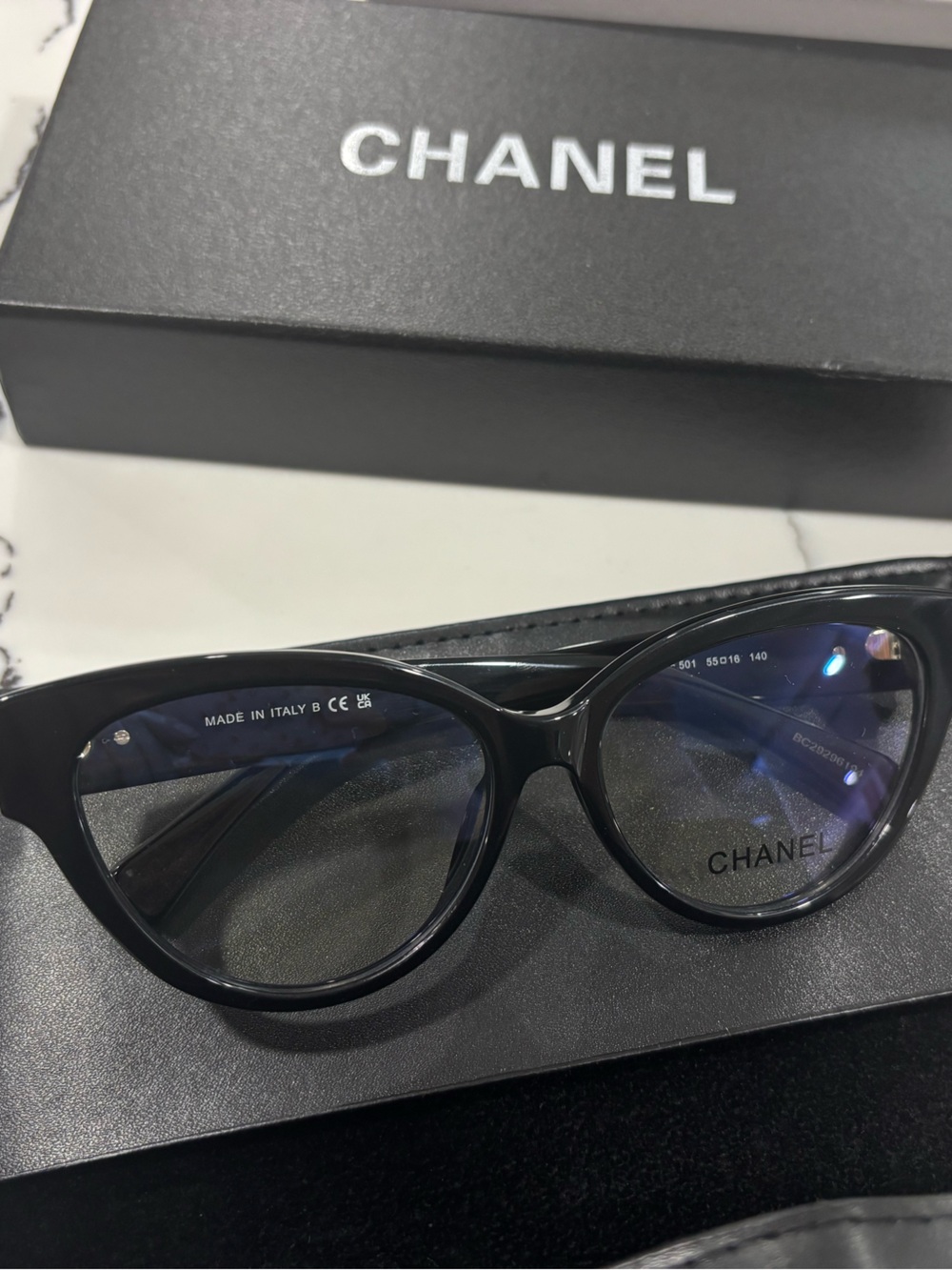 Black Cat-Eye Glasses with Subtle Logo